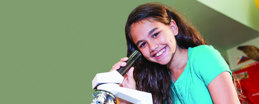 Girl in science class